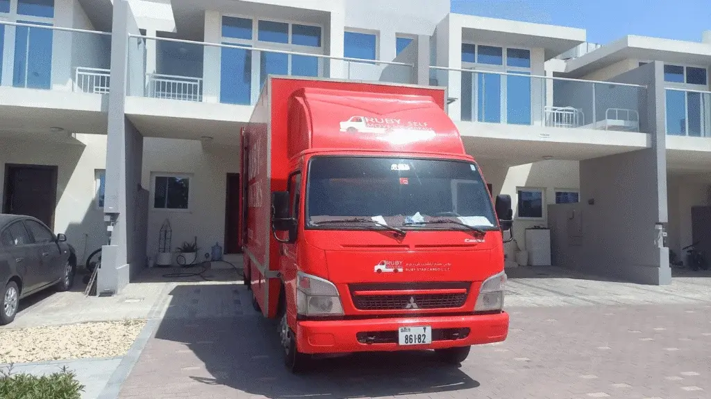 budget moving truck Palm Jumeirah frond road security gate Dubai
